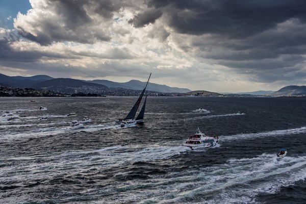Sydney Hobart Line Honors winning WILD OATS finishes under double reef and small jib.