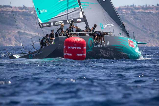Photo by  Keith Brash/Quantum Racing      The telltales of a clean leeward mark rounding: a good upwind exit angle, crew on the rail, no ghosts on the foredeck.
