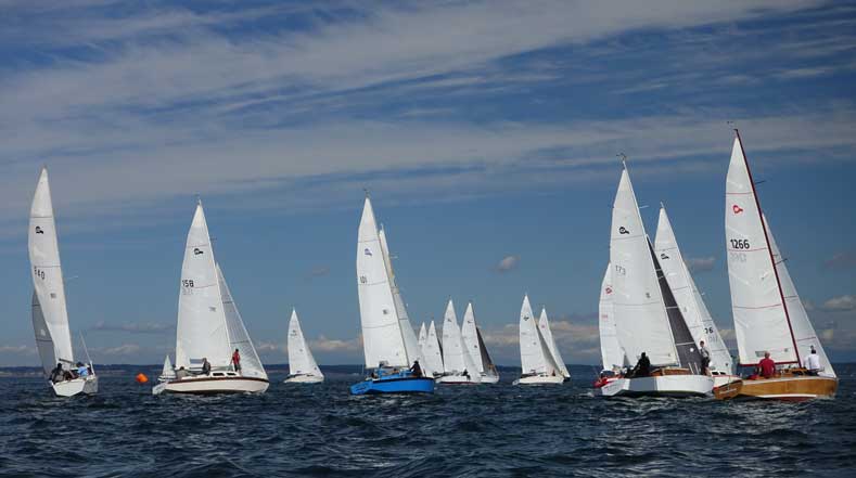The starting line got crowded with 17 boats fighting for a spot. Photo by Steve Scharf.